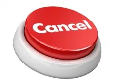 Red button labeled "cancel" mounted on white base