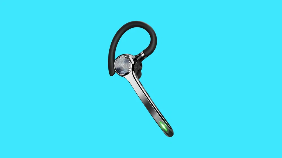 Side view of a Bluetooth earpiece with secure hook, silver stem, and green indicator light on a solid light blue background.