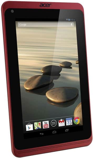 Front angled view of a red Acer tablet showing home screen with water and stone wallpaper and common Google app icons.