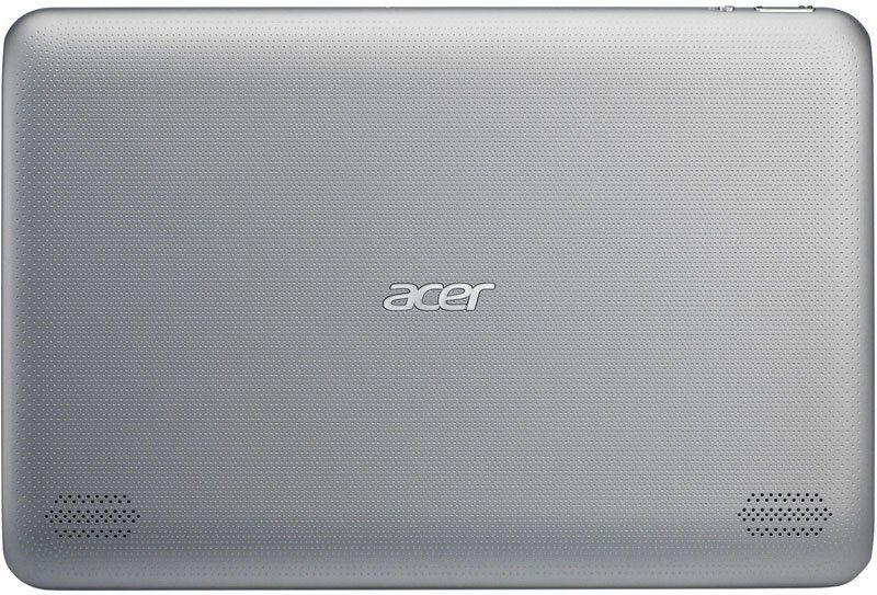 Acer laptop, top view, closed; silver finish with central Acer logo, speaker grills at lower corners, dotted textured surface.