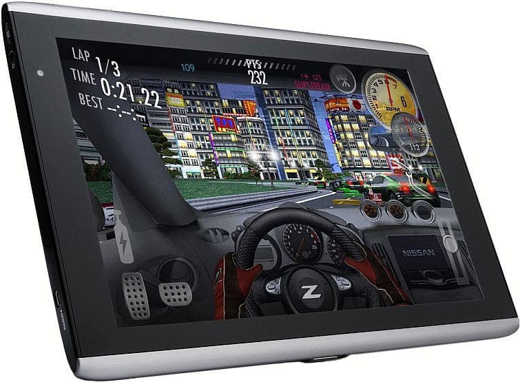 Front view of tablet running a car racing game with on-screen stats; cityscape visible. Tablet brand and model not specified.