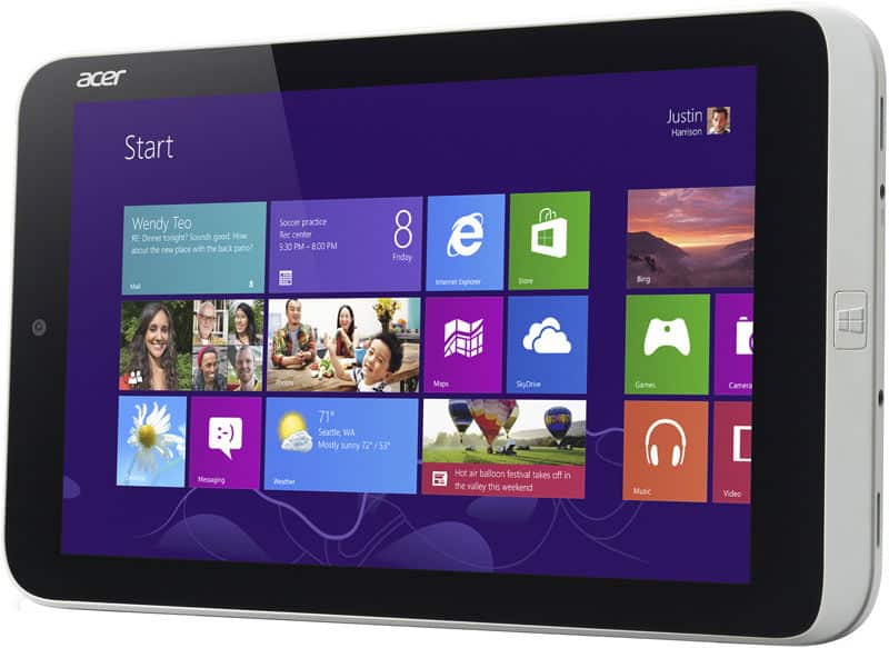Black Acer tablet at an angled front view shows Windows 8 Start screen beside a simple Nokia 105, both on white background.