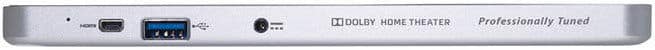 Rear close-up of a silver device showing HDMI, USB ports, small button, and "Dolby Home Theater Professionally Tuned" text.