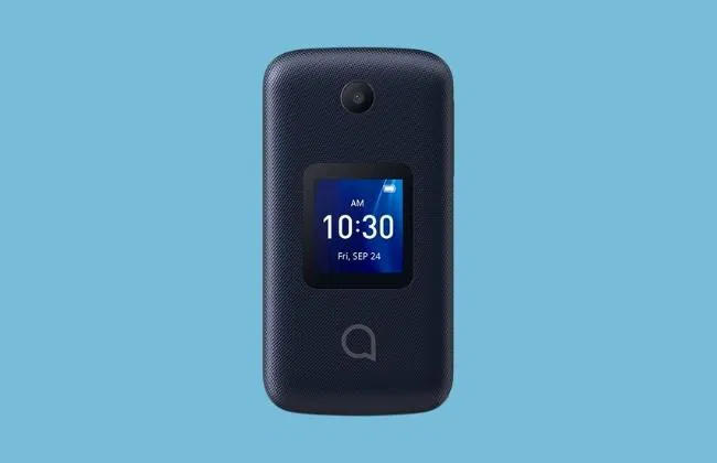 Front view of a closed dark blue senior flip phone with external screen (10:30 AM, Fri Sep 24) and camera above display.
