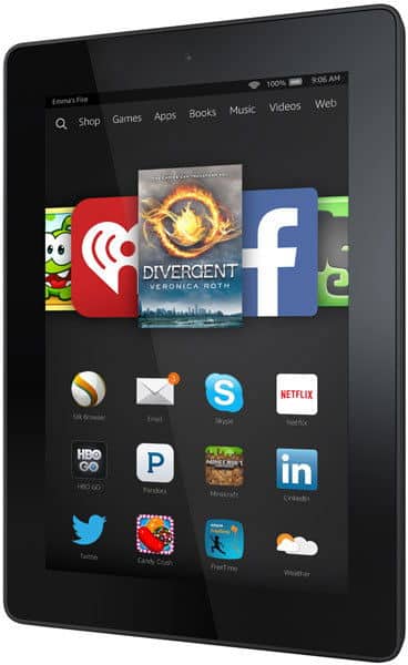 Front view of black tablet showing app icons and "Divergent" e-book cover. Likely Amazon Fire HD home screen.