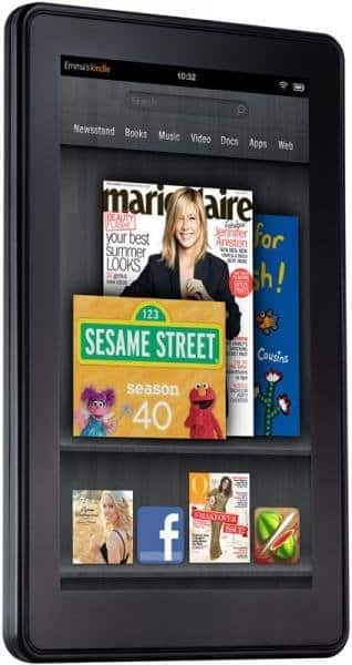 Front view of Amazon Kindle Fire showing home screen with apps, media tiles, and the time 10:32 on its black bezel.