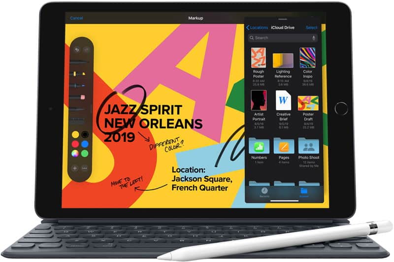 Front view of Apple iPad Pro with keyboard and Apple Pencil, showing split screen: event poster, handwritten notes, file sidebar.