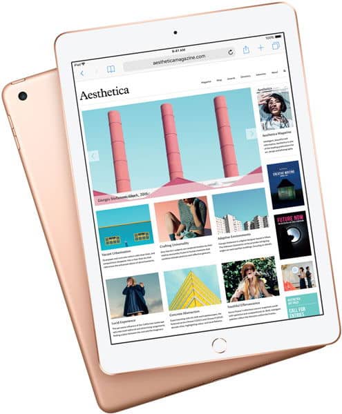 Front view of two gold tablets, likely iPad models, showing "Aesthetica" webpage; second tablet partially behind the first.