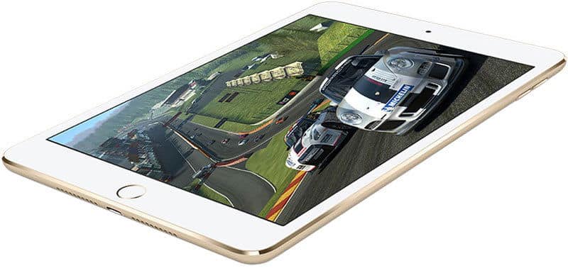 Front view of a gold tablet lying flat, screen on, showing a racing game with two cars on a racetrack.