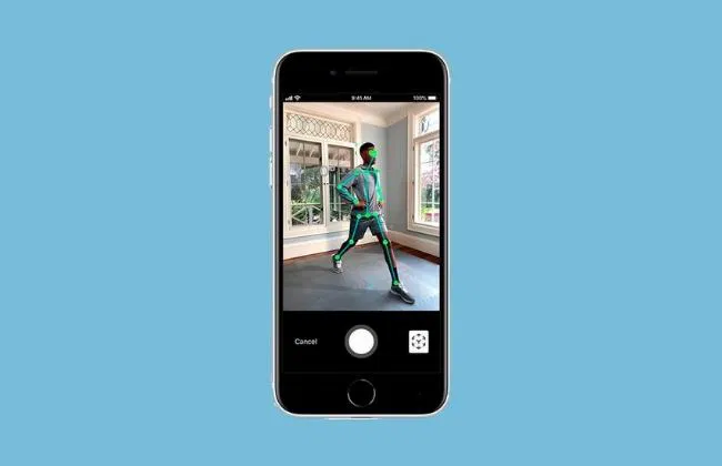 Front view of a senior-friendly smartphone showing pose tracking on screen, person walking indoors, light blue background.
