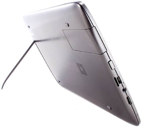 Microsoft Surface tablet rear view, silver finish, kickstand extended, ports and buttons along the device's edge visible.