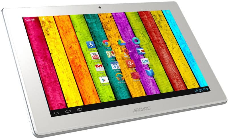 Front view of a white Archos tablet showing colorful wood wallpaper, app icons, and 10:30 time on the home screen.