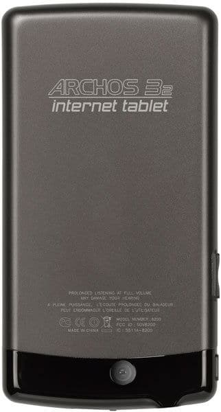Rear view of Archos 32 tablet shows branding, product info, camera lens at bottom, matte gray finish with black accents.