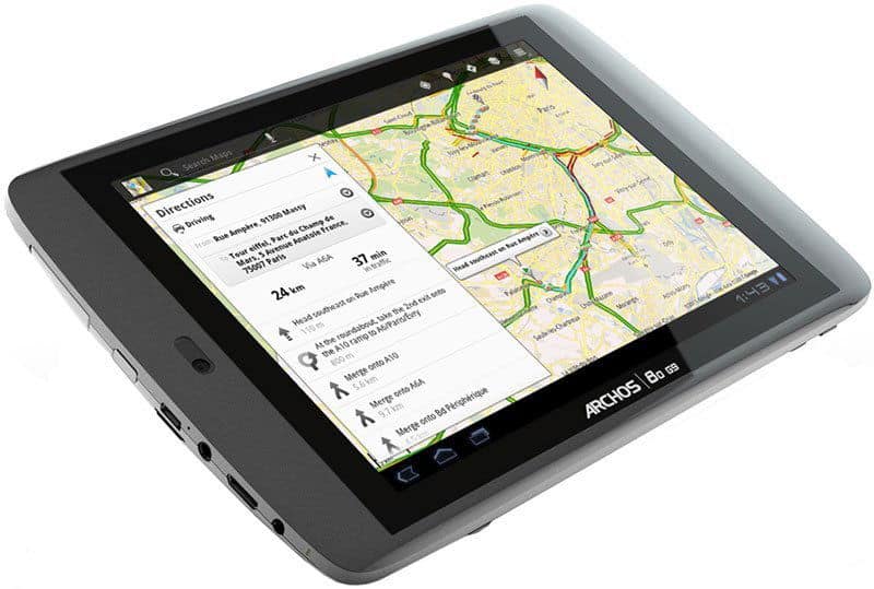 Front view of black and silver tablet, 8GB storage, Google Maps on screen; multiple ports along left edge. Brand/model not shown.