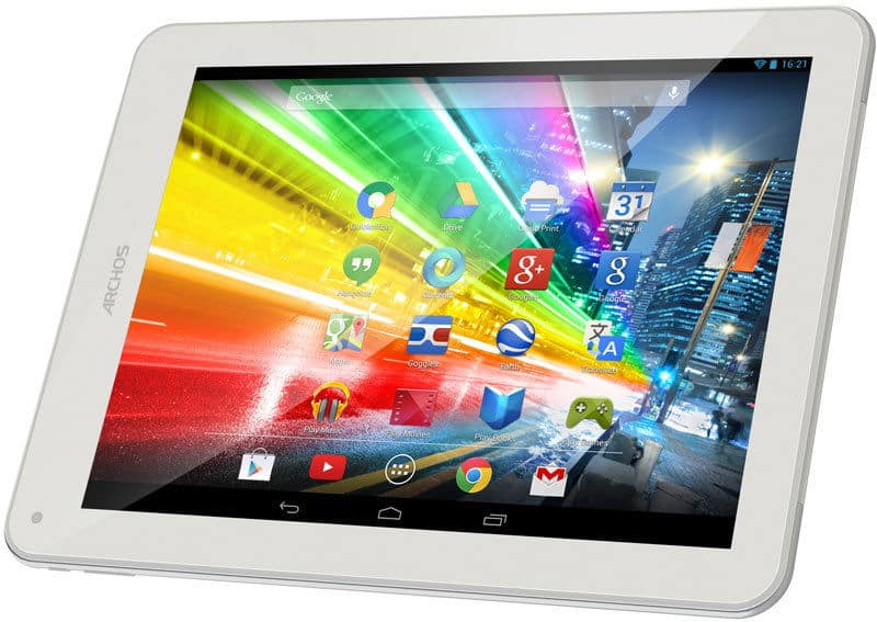 Front view of a white Archos tablet showing cityscape wallpaper and app icons like Gmail, Chrome, YouTube, and Google apps.