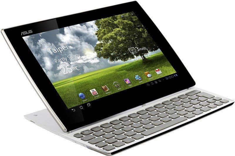Front view of a Samsung Galaxy Tab S8 with detachable white keyboard, weather widget for Taipei, apps, and green field wallpaper.