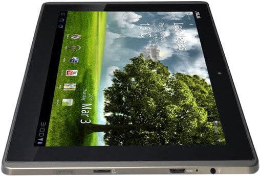 ASUS tablet, front angled view, shows home screen with green landscape, tree, weather widget, app icons, and March 3 date.