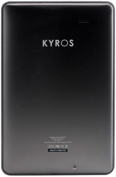 Rear view of black Coby Kyros tablet; brand name centered, specs at bottom, reset button near lower right edge.