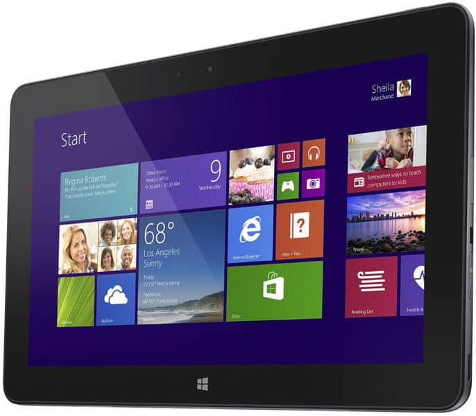 Microsoft Surface front view showing Windows 8 start screen with colorful app tiles; date displayed is Wednesday, October 9.