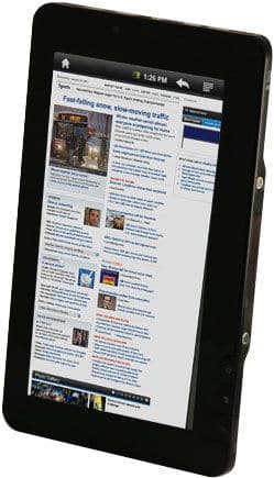 Black tablet, likely iPad, front angled view showing news website with headlines, images, articles; screen time reads 1:26 PM.