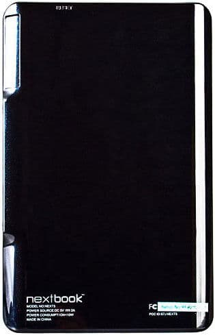 Rear view of black Nextbook tablet showing model info, power input details, and white regulatory markings on a glossy surface.