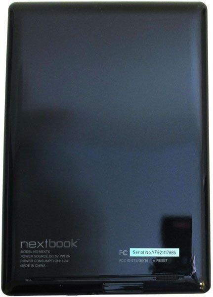 Nextbook tablet rear view showing brand, model details, FCC label, and reset button near the bottom.