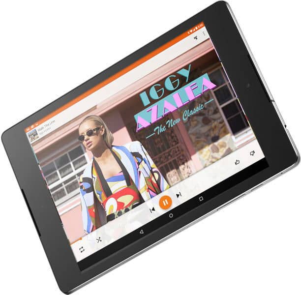 Front view of a tablet, likely an iPad, running a music app with Iggy Azalea's "The New Classic" album cover visible onscreen.