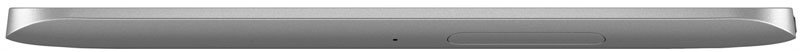 Side close-up of a silver and gray tablet edge, showing a small button and microphone hole; brand and model not identifiable.