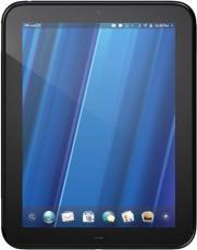 Front view of a black tablet with thick bezel, blue diagonal lines wallpaper, and app icons docked at the bottom of the screen.