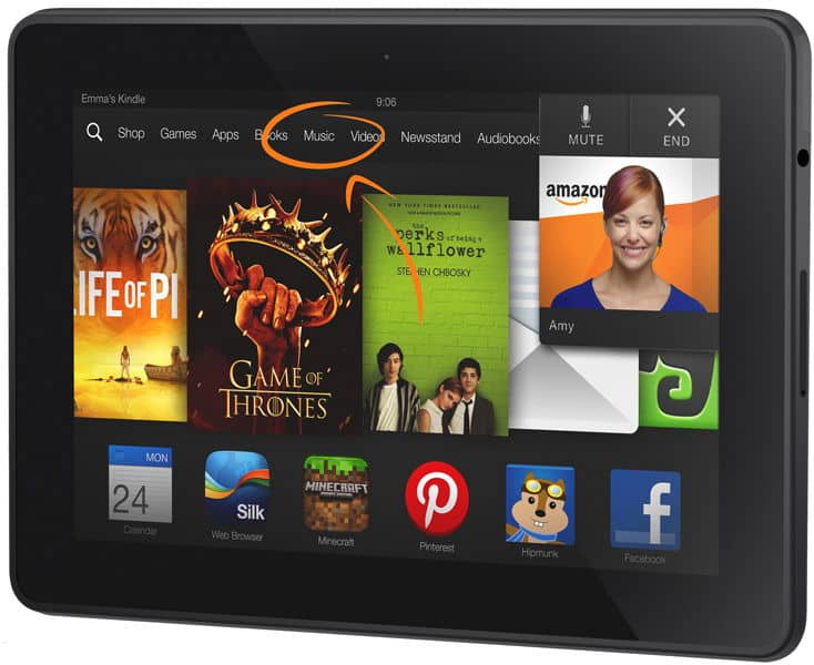 Front view of a tablet showing media apps and an active Amazon video call with Amy in the top right corner.