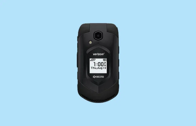 Front view of closed black Verizon Kyocera flip phone showing time, date, and icons on external display against blue background.