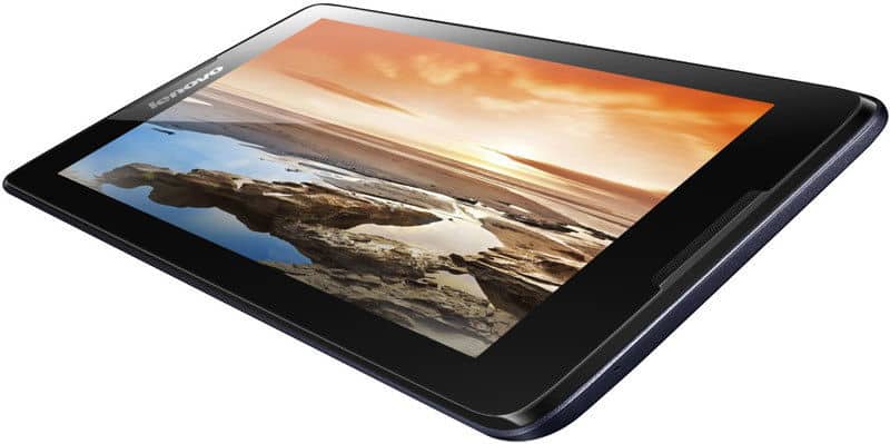 Black Lenovo tablet, angled front view, displays a coastal landscape with rocks, water, and cloudy sunset sky on screen.