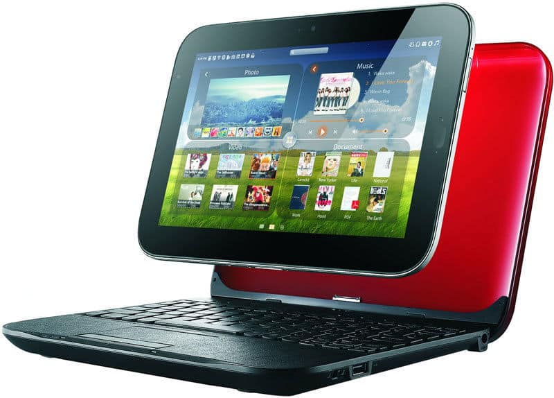 Front view of a black and red convertible laptop in tablet mode, showing touchscreen with app icons for photos, music, and documents.