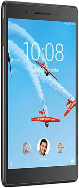 Front view of a black Lenovo tablet displaying 10:08, 7 December; screen shows three red planes with smoke trails on blue sky.