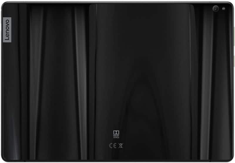 Rear view of black Lenovo tablet shows top-right camera, left-side Lenovo logo, and Dolby Atmos plus certification marks in center.