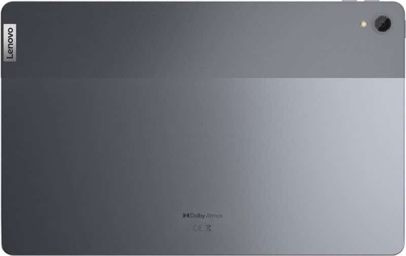 Lenovo tablet rear view showing silver-gray gradient, top-right camera, Lenovo and Dolby Atmos logos visible.