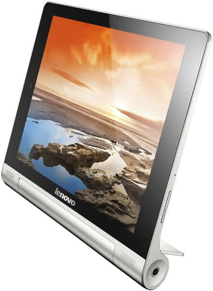 Lenovo Yoga Tablet stands upright on cylinder kickstand, front view, screen displays sunset over rocky shoreline.