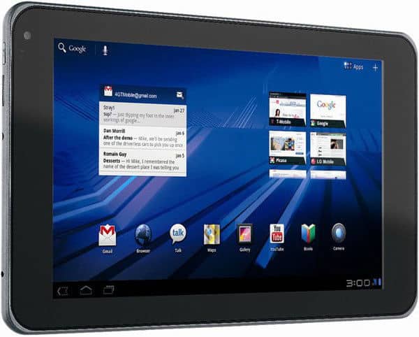 Front view of a black tablet, home screen with app icons, widgets, blue geometric wallpaper; screen time set to 3:00. Brand/model not shown.