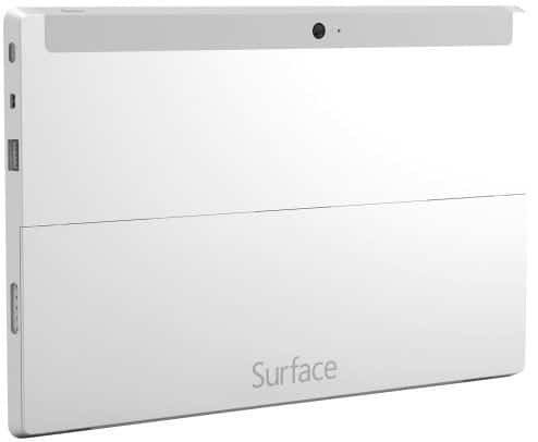 Rear view of Microsoft Surface tablet showing rear camera, kickstand extended, side ports, and Surface logo near the bottom.