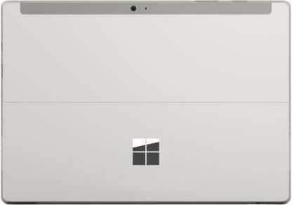 Rear view of Microsoft Surface tablet, silver finish, centered Windows logo, and top-edge rear camera visible.