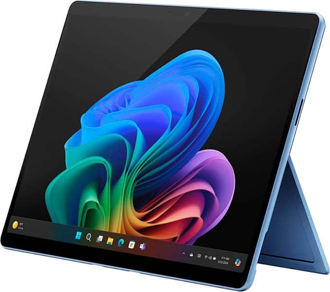 Tablet with built-in stand shown in angled front view, displaying colorful wallpaper, app icons, and Windows OS interface.