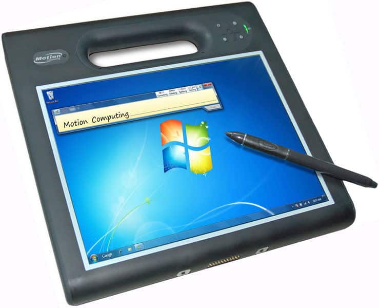 Motion Computing tablet (front view) with handle, stylus, Windows 7 OS, and note app open; digital pen rests on device.