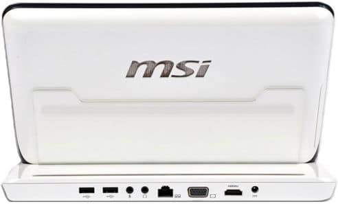 Rear view of white MSI laptop docked, logo on lid visible, base shows USB, headphone, VGA, HDMI, and Ethernet ports.