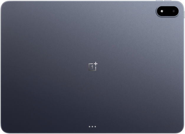 Rear view of Apple iPad in silver, center Apple logo and top right camera visible, diagonal shadow across the back.