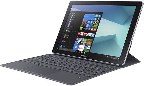 Angled front view of Samsung tablet with detachable keyboard, showing Windows OS home screen and app icons.