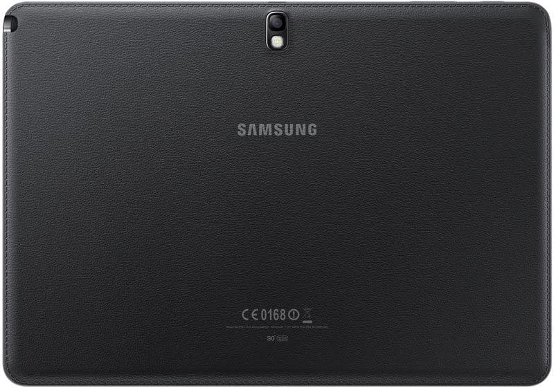 Rear view of black Samsung tablet with top-center camera, central logo, bottom certifications, and textured leather-like finish.