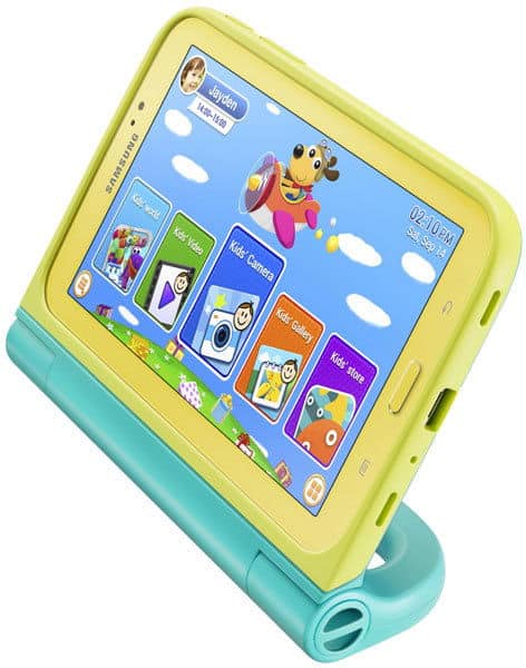Front view of Samsung kids tablet in yellow-green case on blue stand, showing colorful kids' app icons and a bee character.