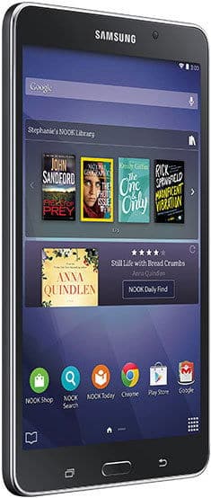 Samsung tablet, possibly Galaxy Tab, front angled view showing NOOK app interface with book covers and app icons on home screen.