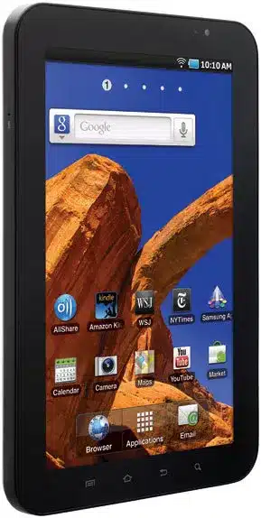 Samsung Galaxy Tab with home screen displayed, showing app icons and a landscape photo of red rock formations