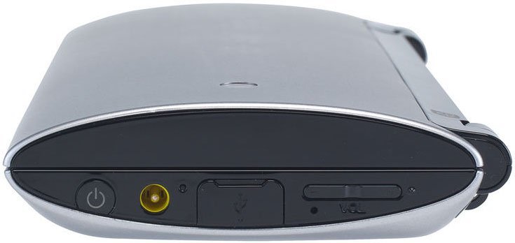 Front panel close-up of a tablet showing power, reset, volume controls, USB port, yellow circular port on silver and black casing.
